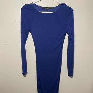 Used guess blue dress with one side longer than other detail on the bottom